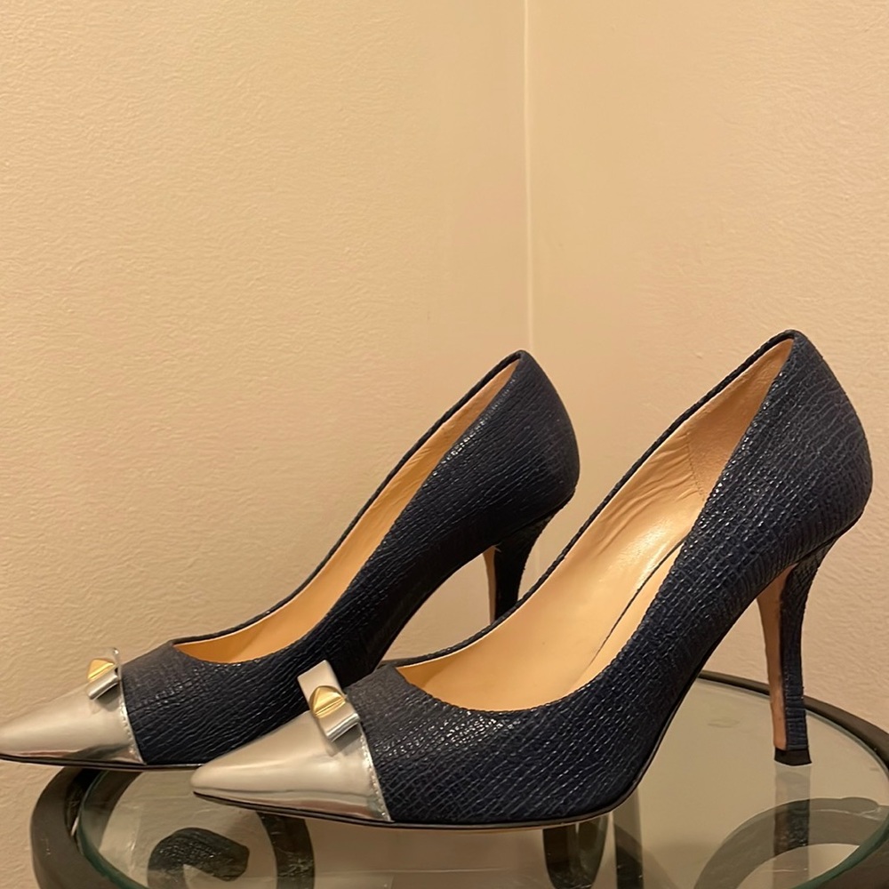 Navy classic Kate spade pumps.
